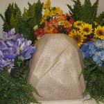 Watering Rock surrounded by plants