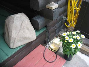 Watering rock on porch
