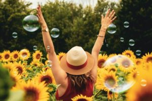 girl in a field of sunflowers